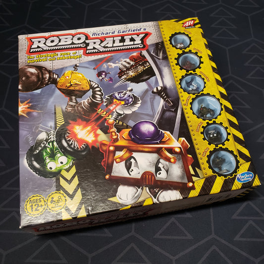 Image shows the front cover of the box  of the 2016 Edition of the Robo Rally board game