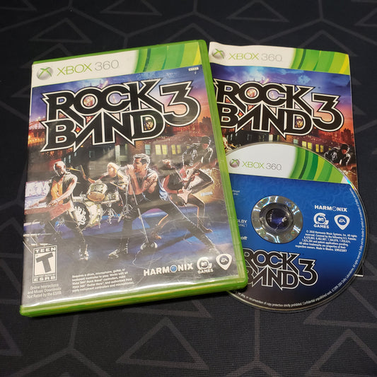 Image shows the case, manual & disc for the video game Rock Band 3 for Xbox 360