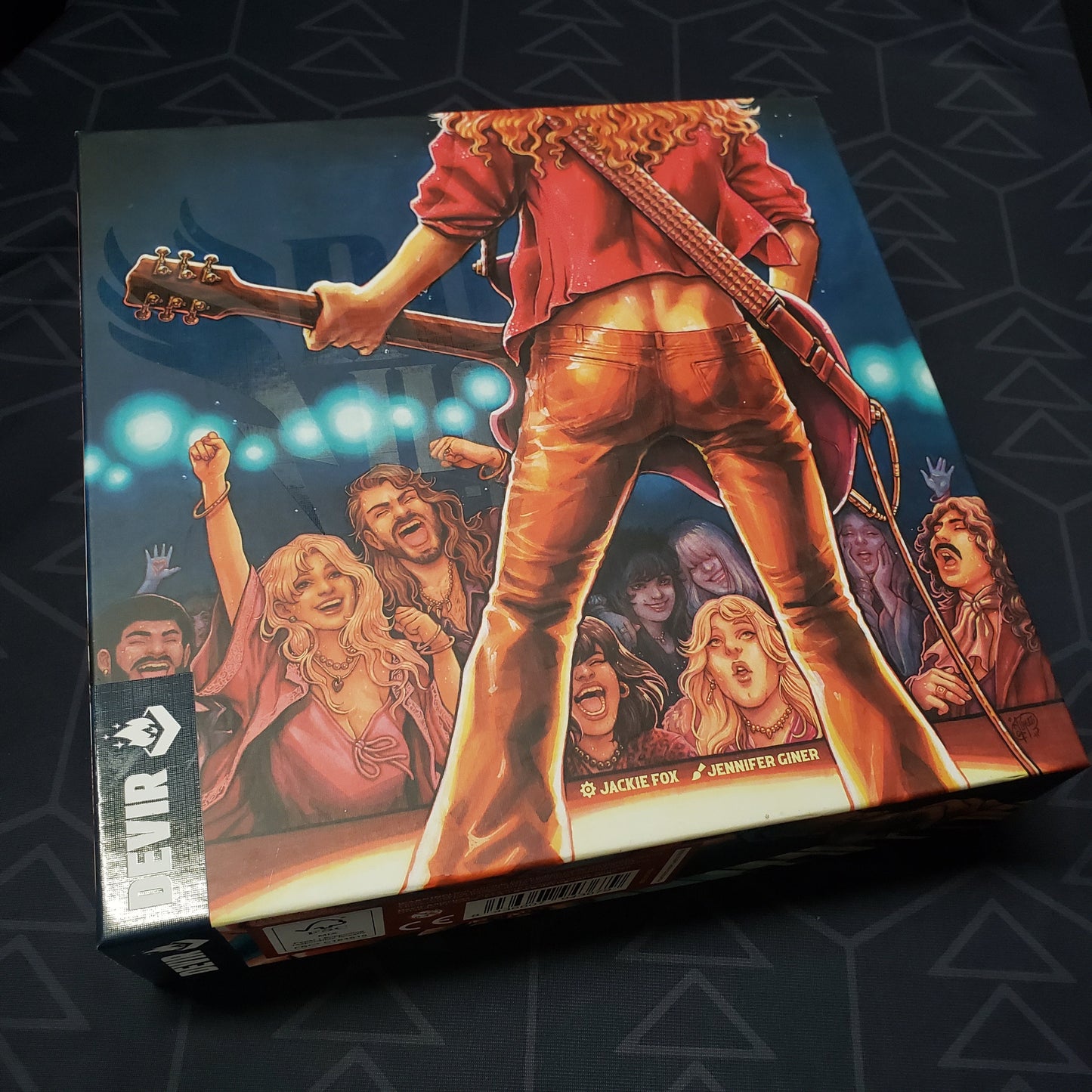 Image shows the front cover of the box for the Rock Hard: 1977 board game