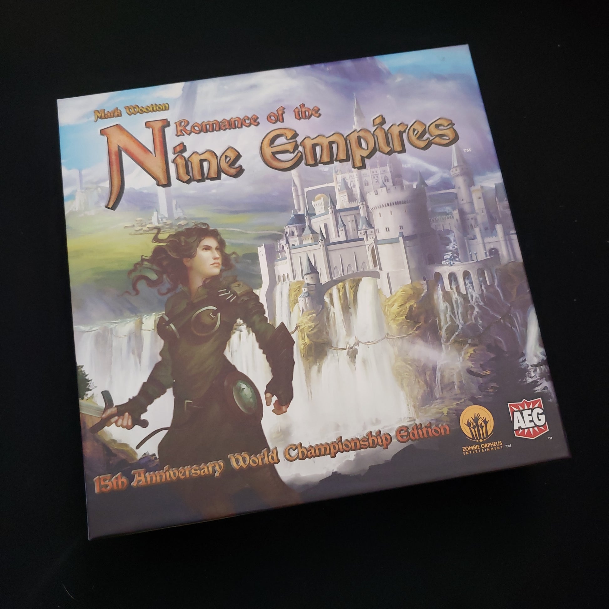 Image shows the front cover of the box of the Romance of the Nine Empire card game