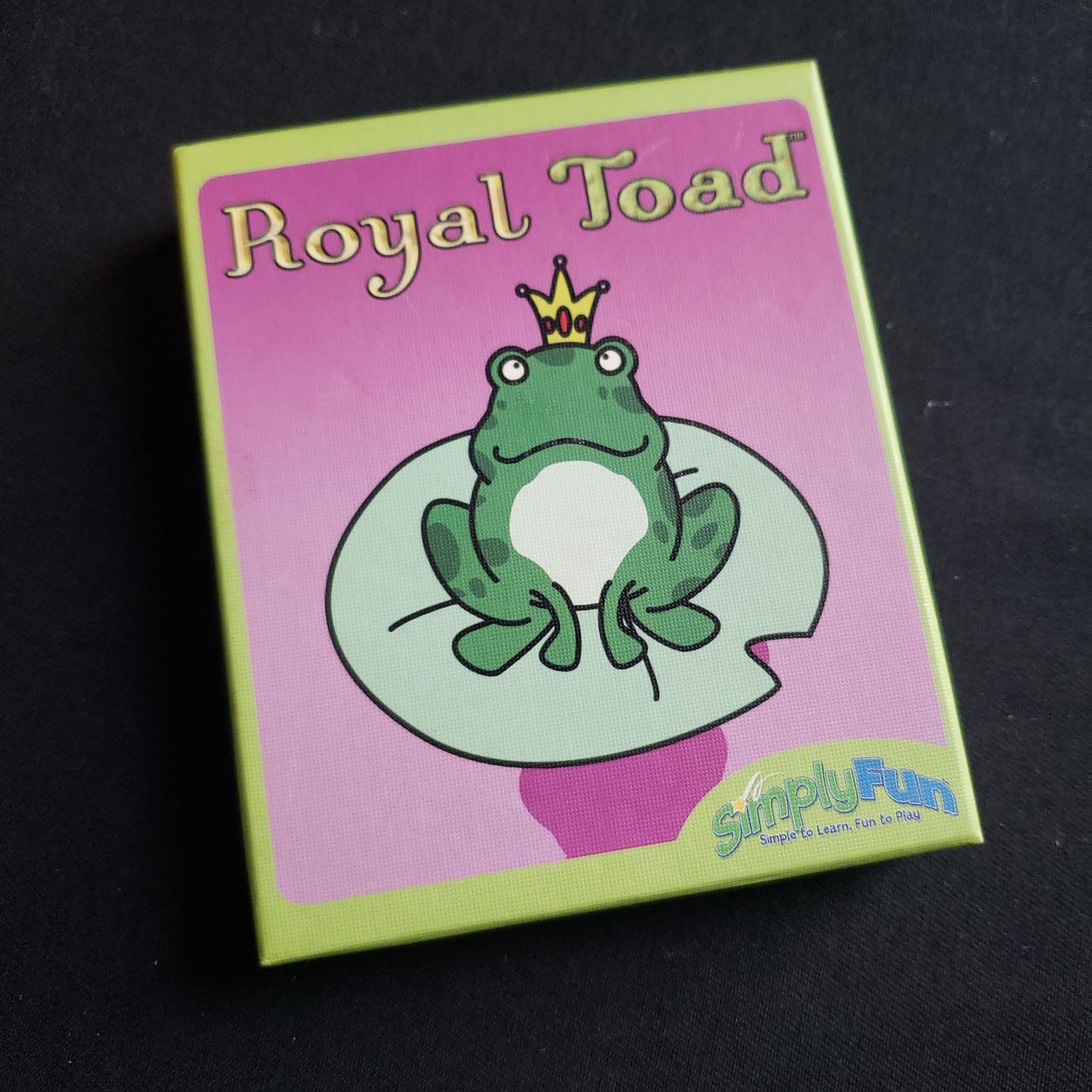 Image shows the front cover of the box of the Royal Toad card game