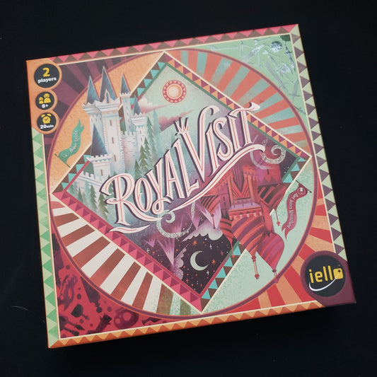 Image shows the front cover of the box of the Royal Visit board game