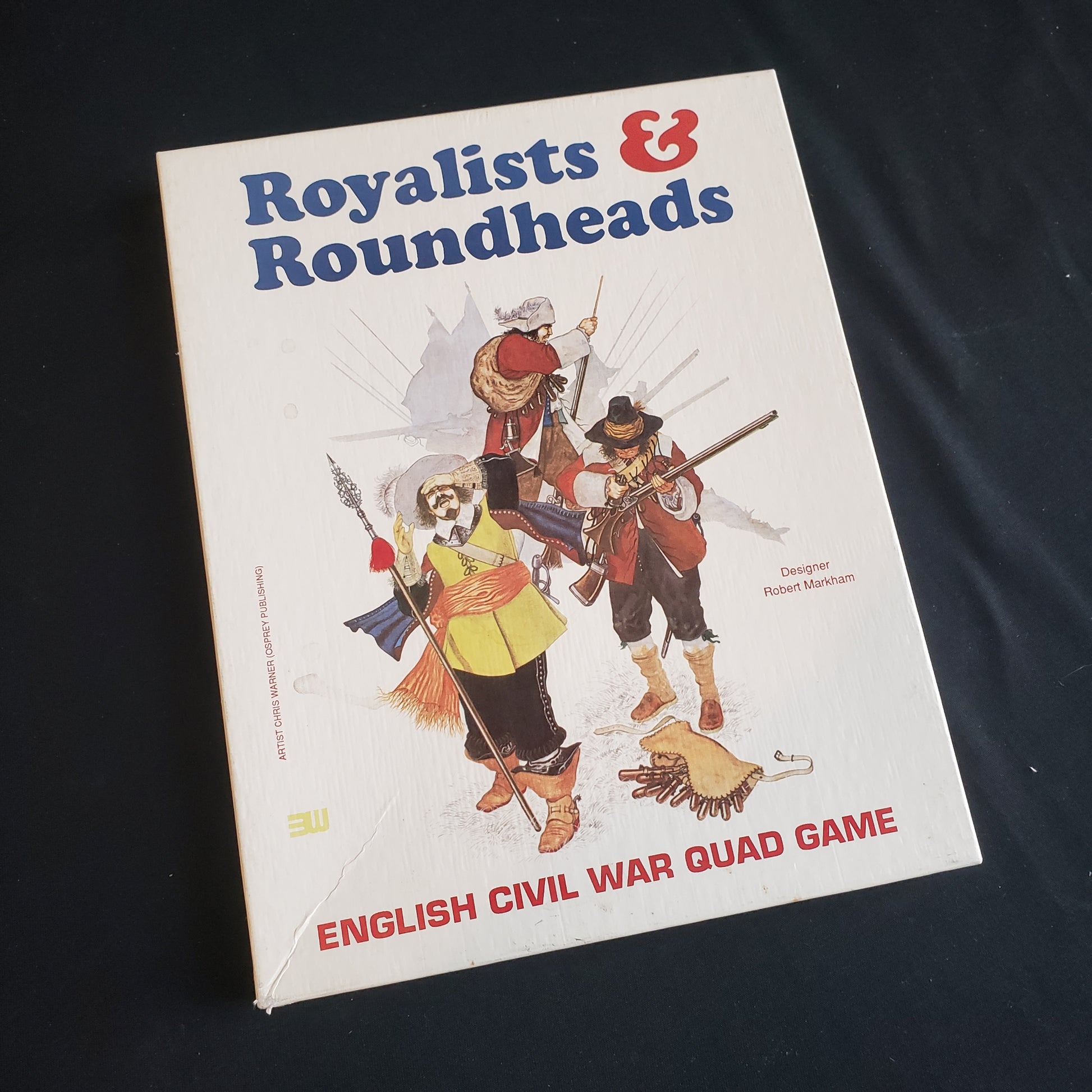 Image shows the front cover of the box of the board game Royalists & Roundheads