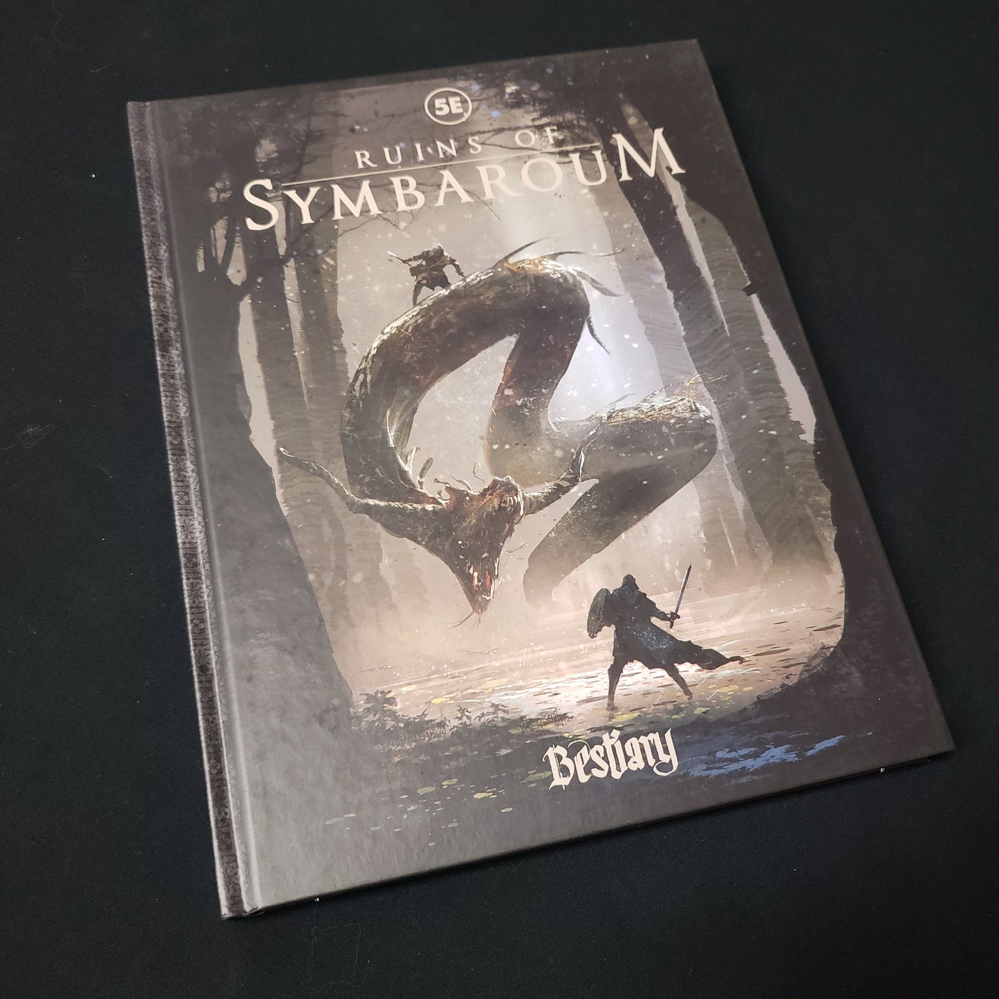 Image shows the front cover of the Bestiary book for the Ruins of Symbaroum roleplaying game