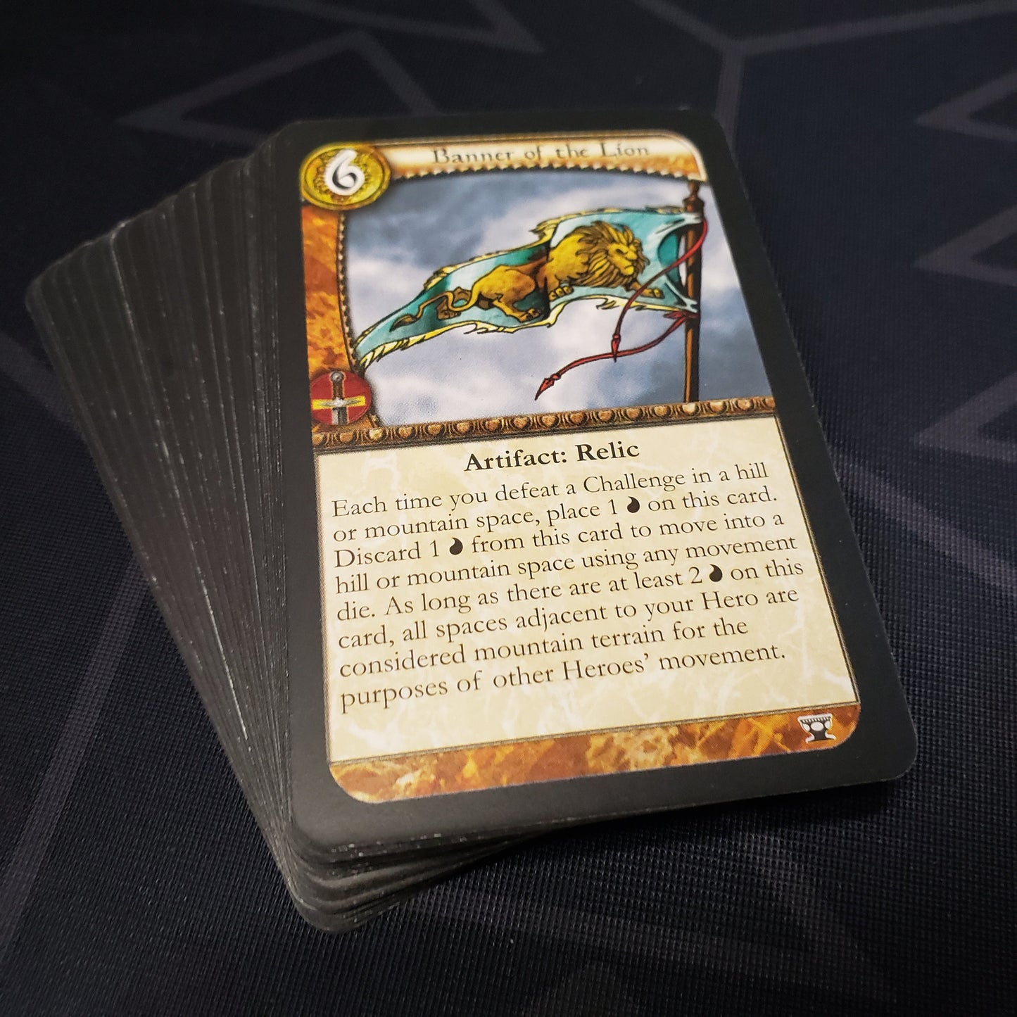 Image shows the cards fanned out in a stack for the Relics of Legend expansion for the board game Runebound: Second Edition