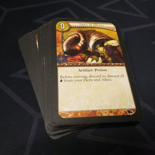 Image shows the cards fanned out in a stack for the Walkers of the Wild expansion for the board game Runebound: Second Edition