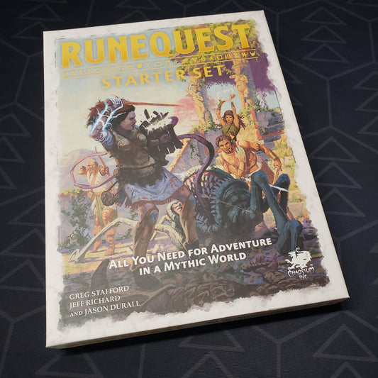 Image shows the front of the box of the starter set for the roleplaying game RuneQuest