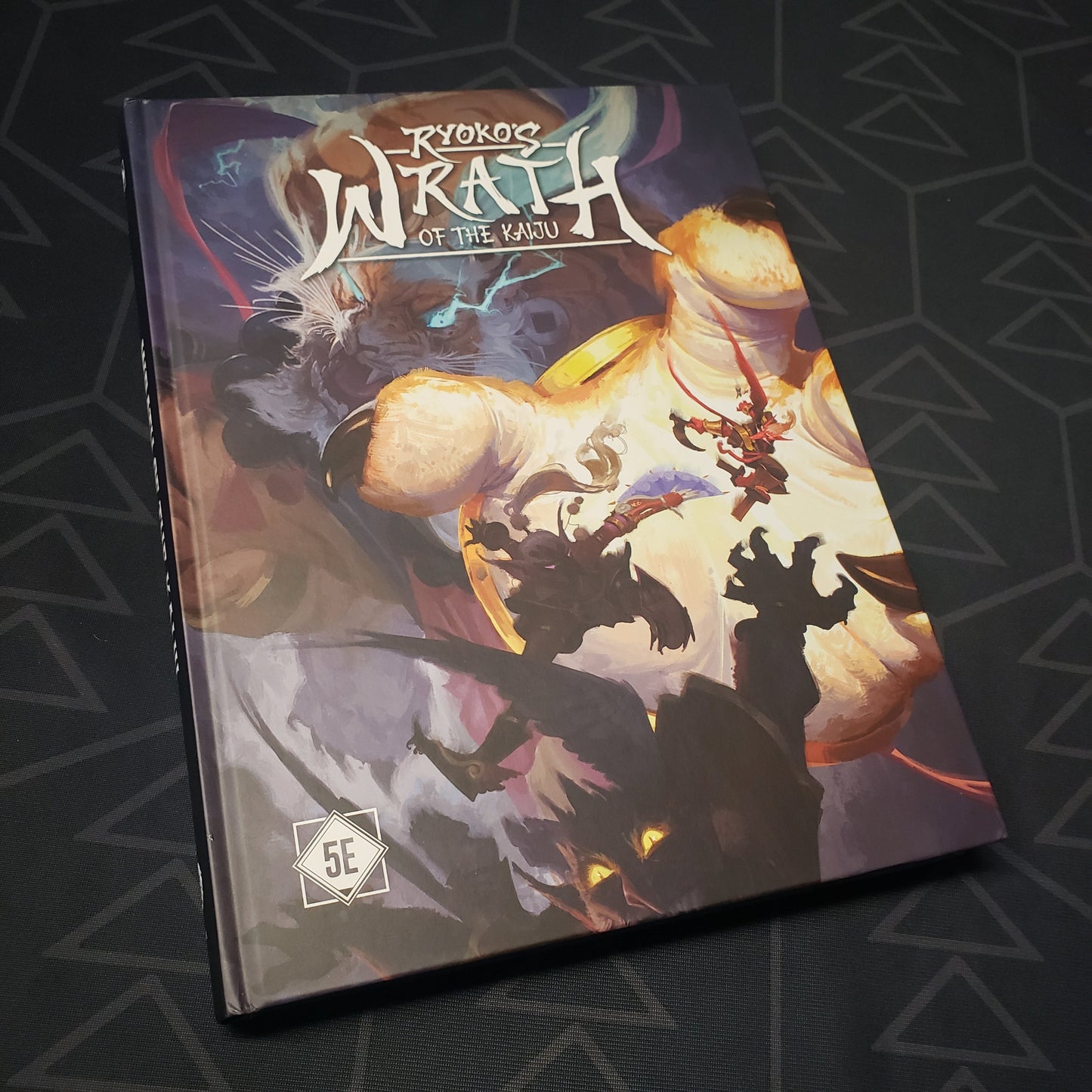 Image shows the front cover of the Ryoko's Wrath of the Kaiju roleplaying game book