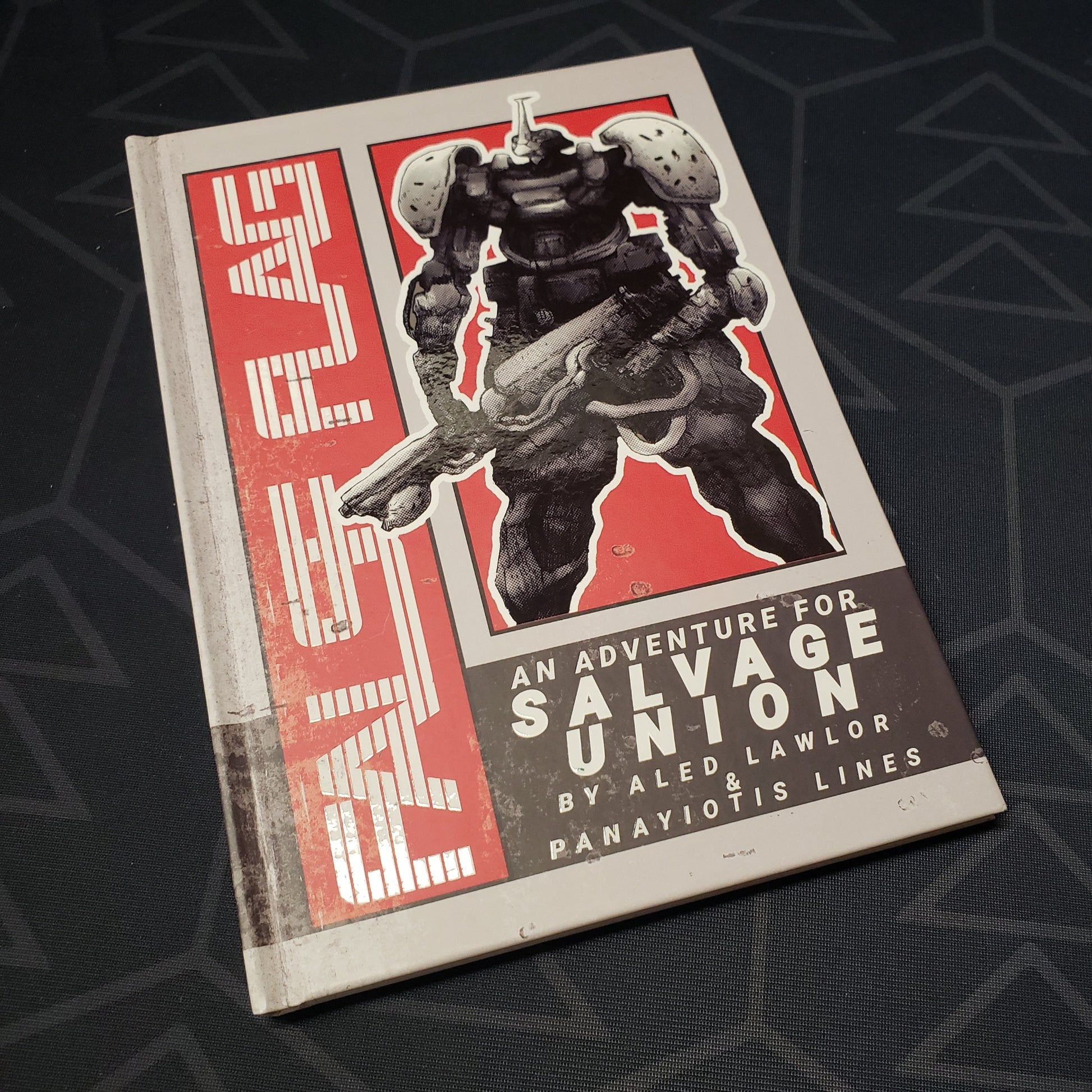 Image shows the front cover of the False Flag book for the roleplaying game Salvage Union