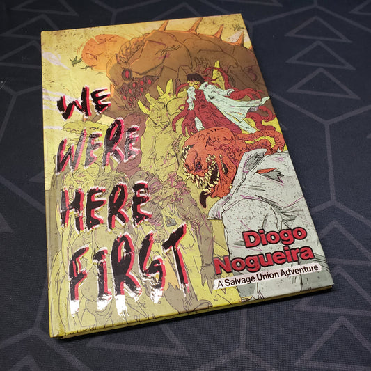 Image shows the front cover of the We Were Here First book for the roleplaying game Salvage Union
