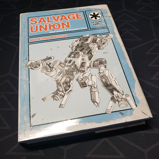 Image shows the front cover of the Workshop Manual book for the Salvage Union roleplaying game