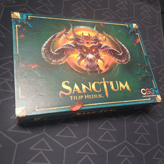 Image shows the front cover of the box for the Sanctum board game
