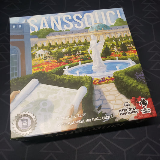 Image shows the front cover of the box for the Sanssouci board game