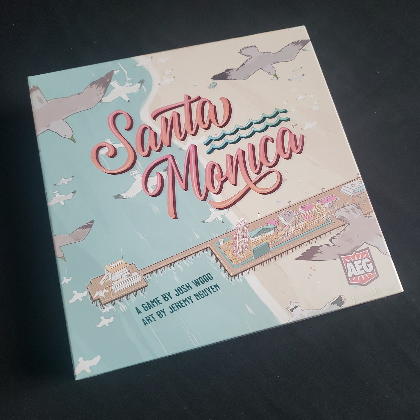 Image shows the front cover of the box of the Santa Monica board game