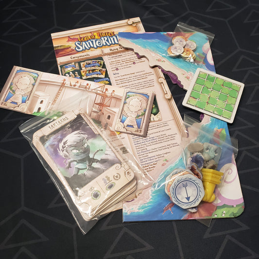 Image shows the instructions and components for the Golden Fleece expansion for the board game Santorini