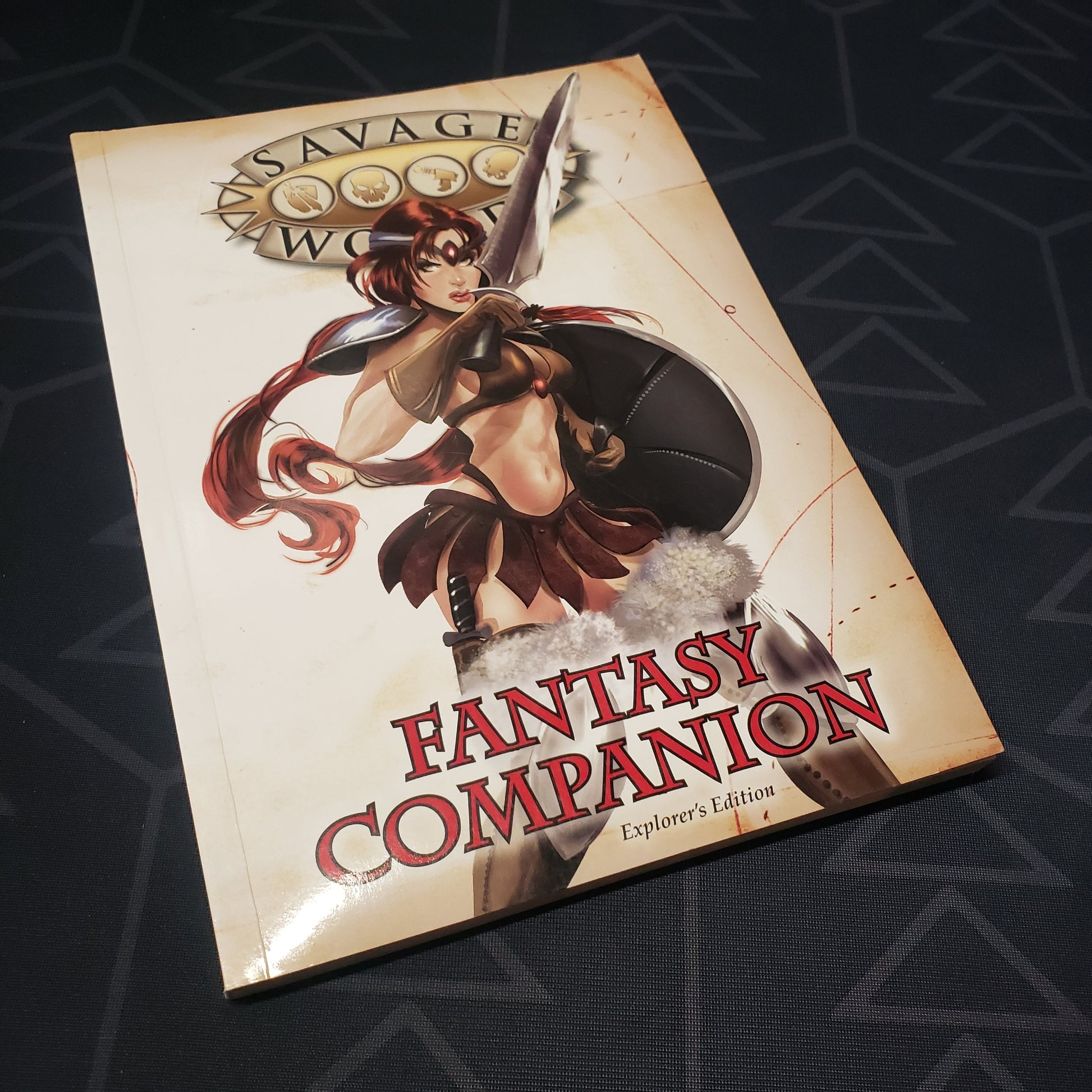 Image shows the front cover of the Fantasy Companion book for the roleplaying game Savage Worlds