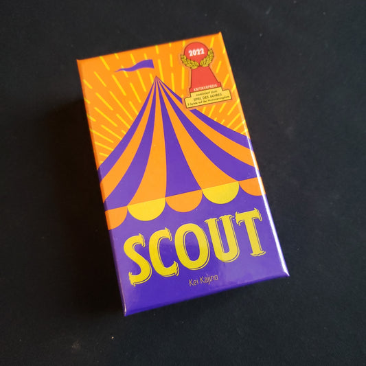Image shows the front cover of the box of the Scout card game