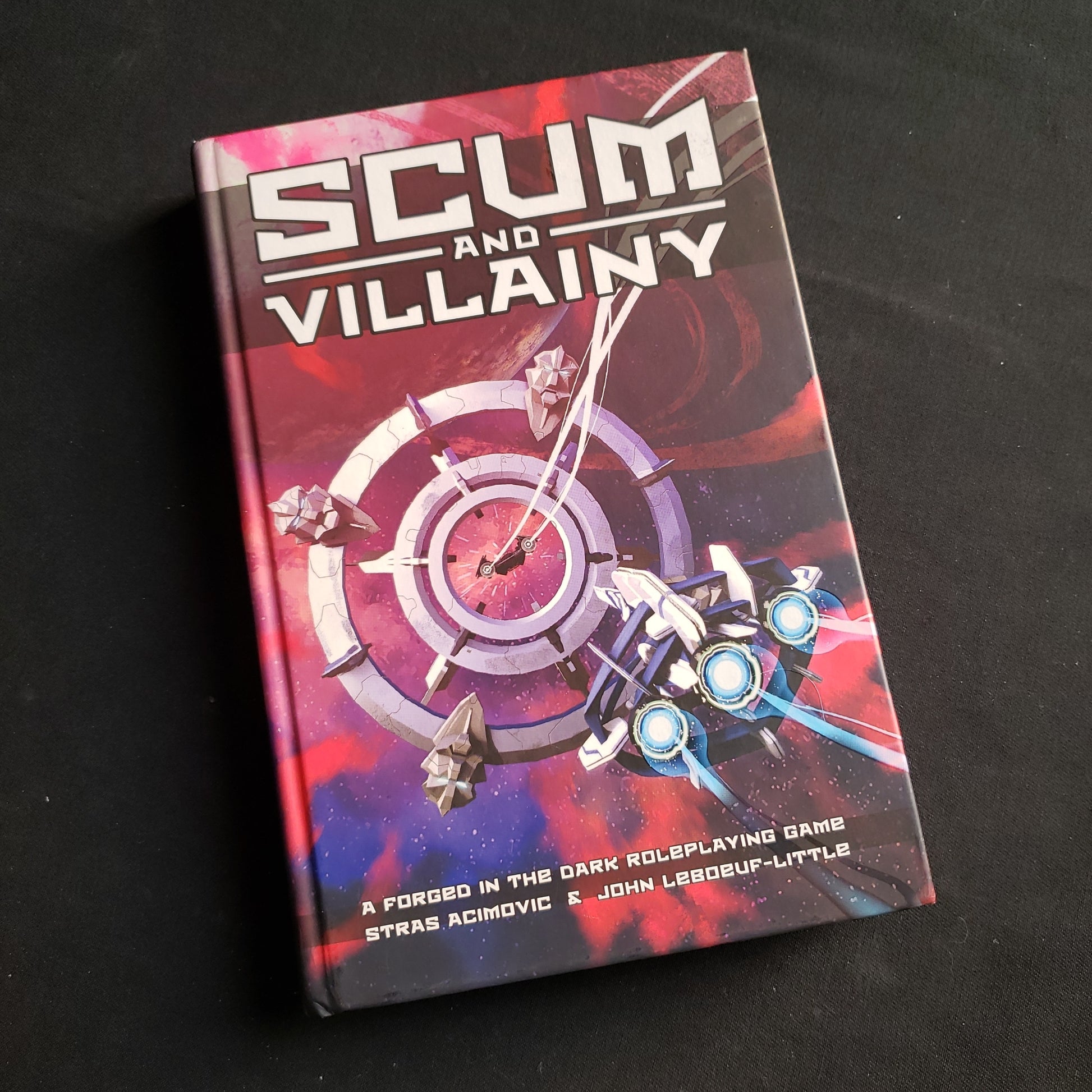 Image shows the front cover of the Scum & Villainy roleplaying game book