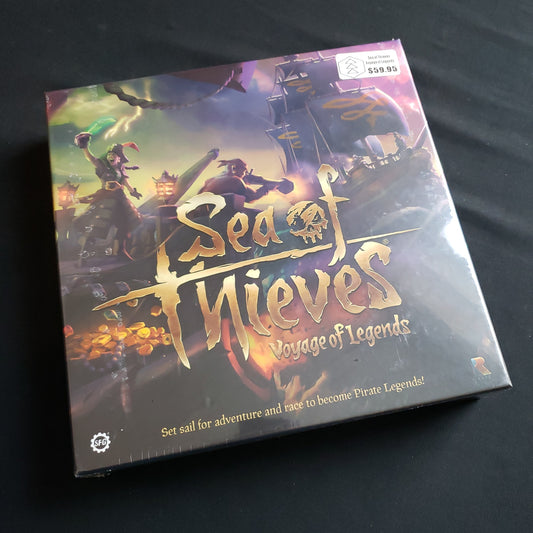 Image shows the front cover of the box of the Sea of Thieves: Voyage of Legends board game