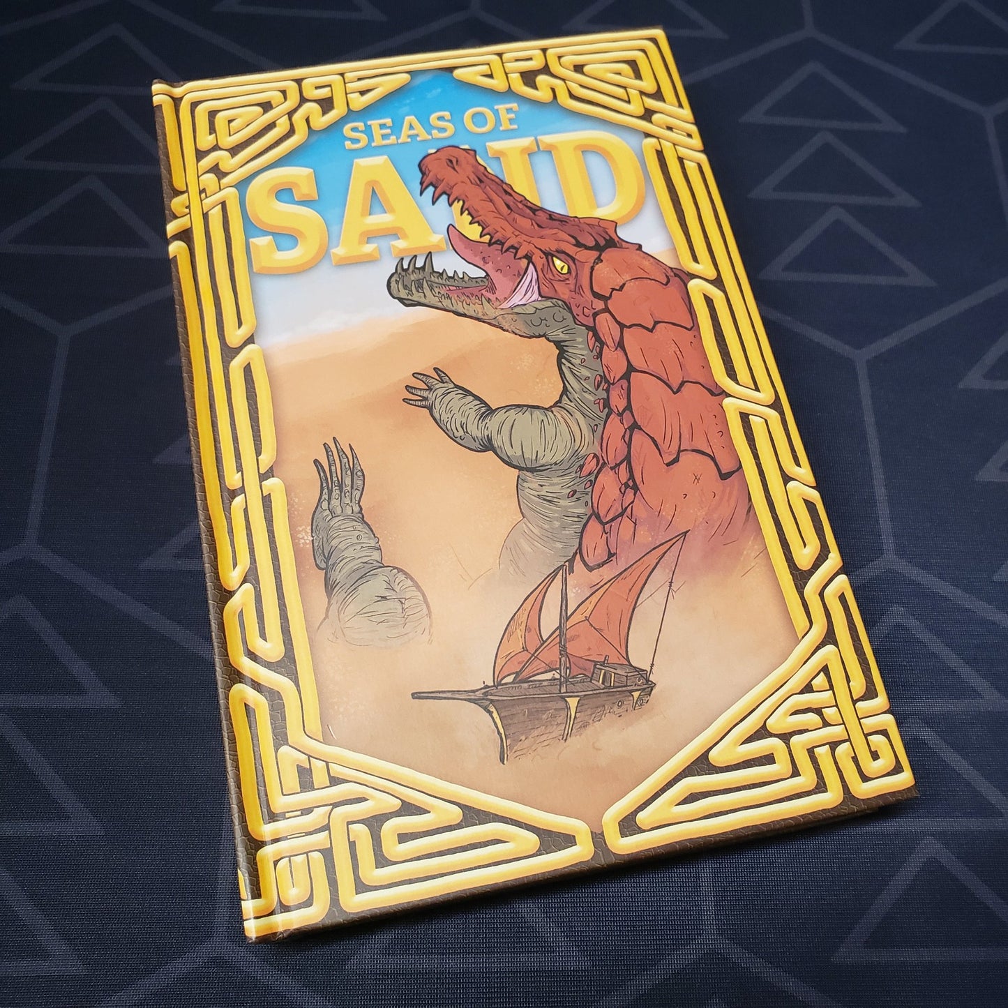 Image shows the front cover of the Seas of Sand roleplaying game book