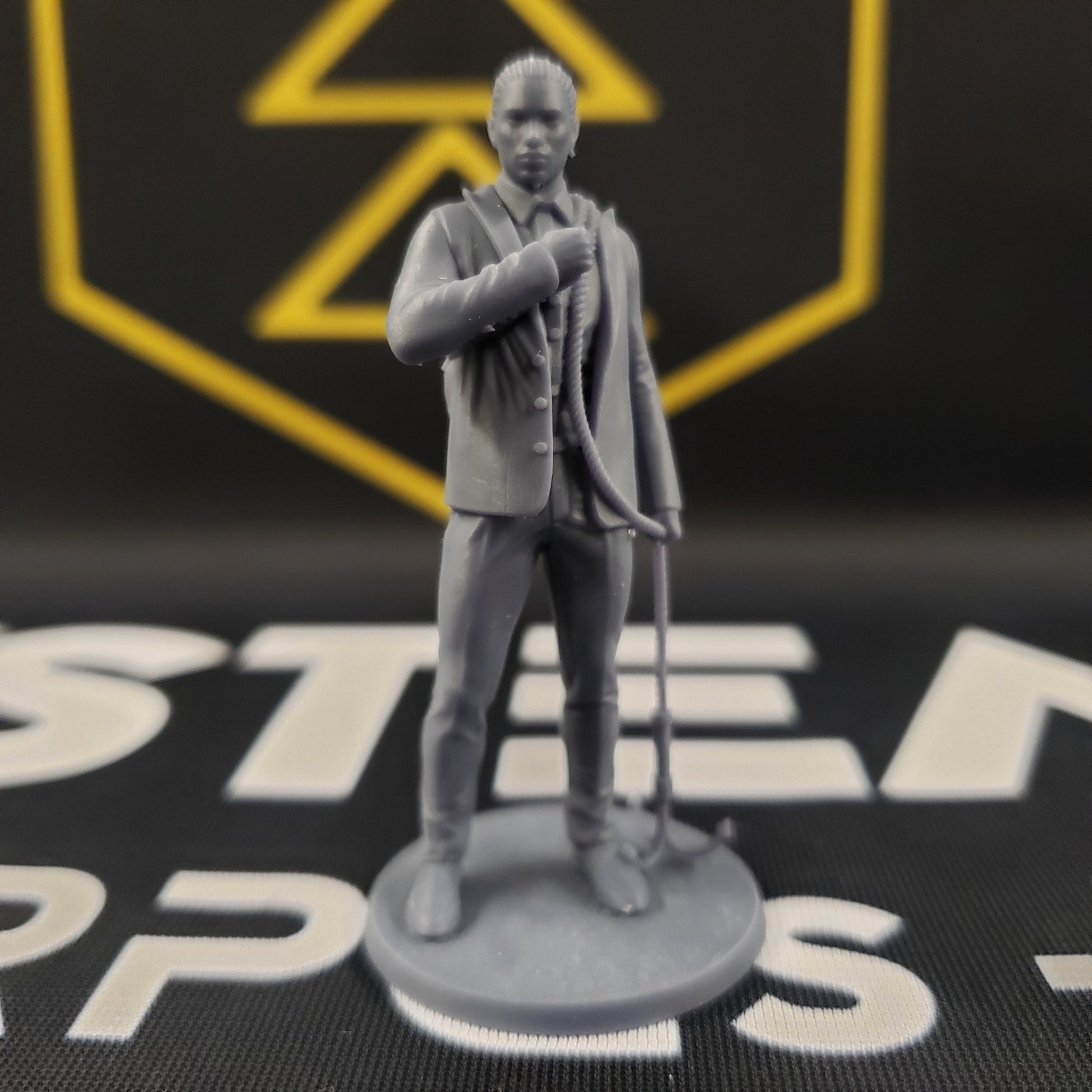 Image shows a security consultant 3D printed gaming miniature.