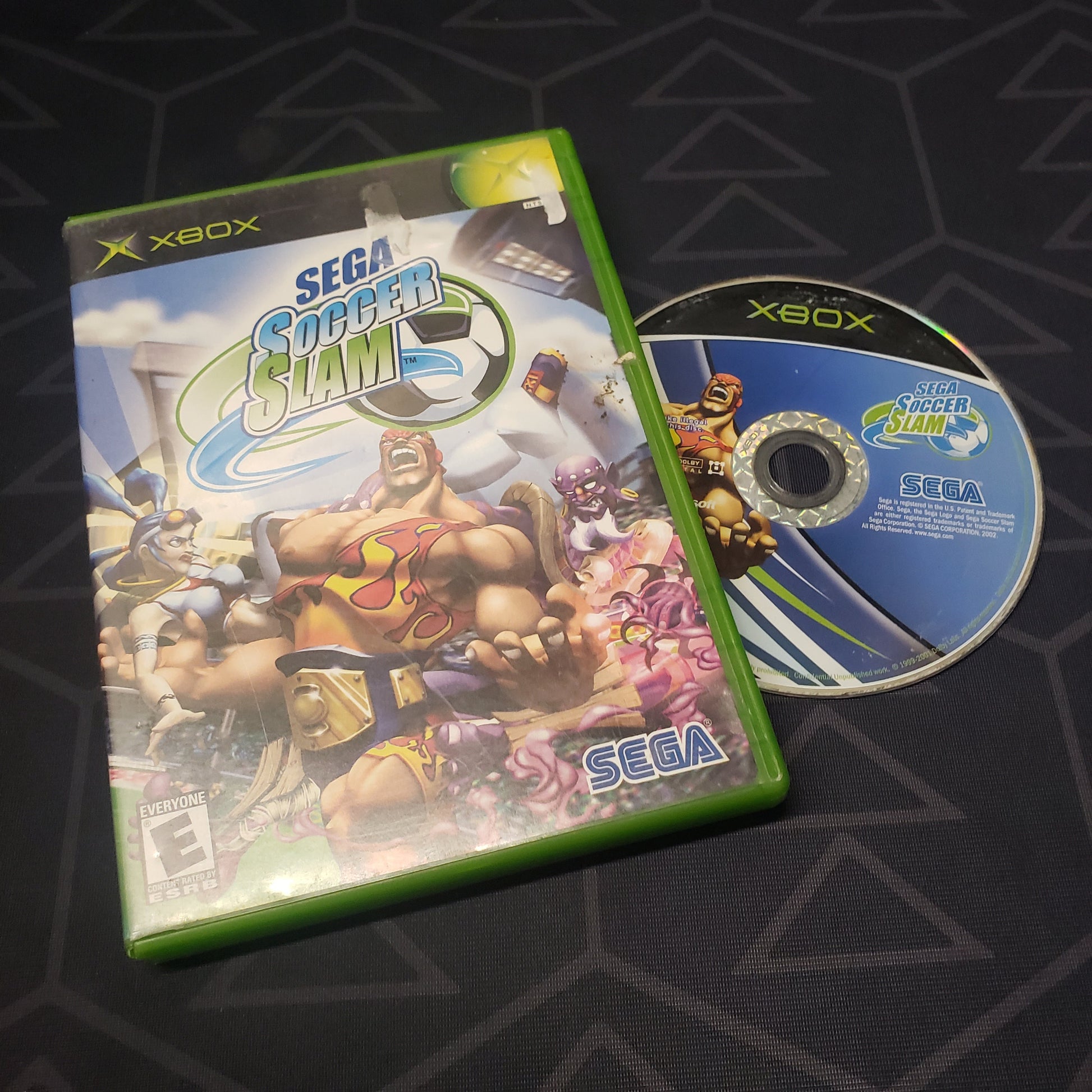 Image shows the case and disc for the video game Sega Soccer Slam for the original Xbox
