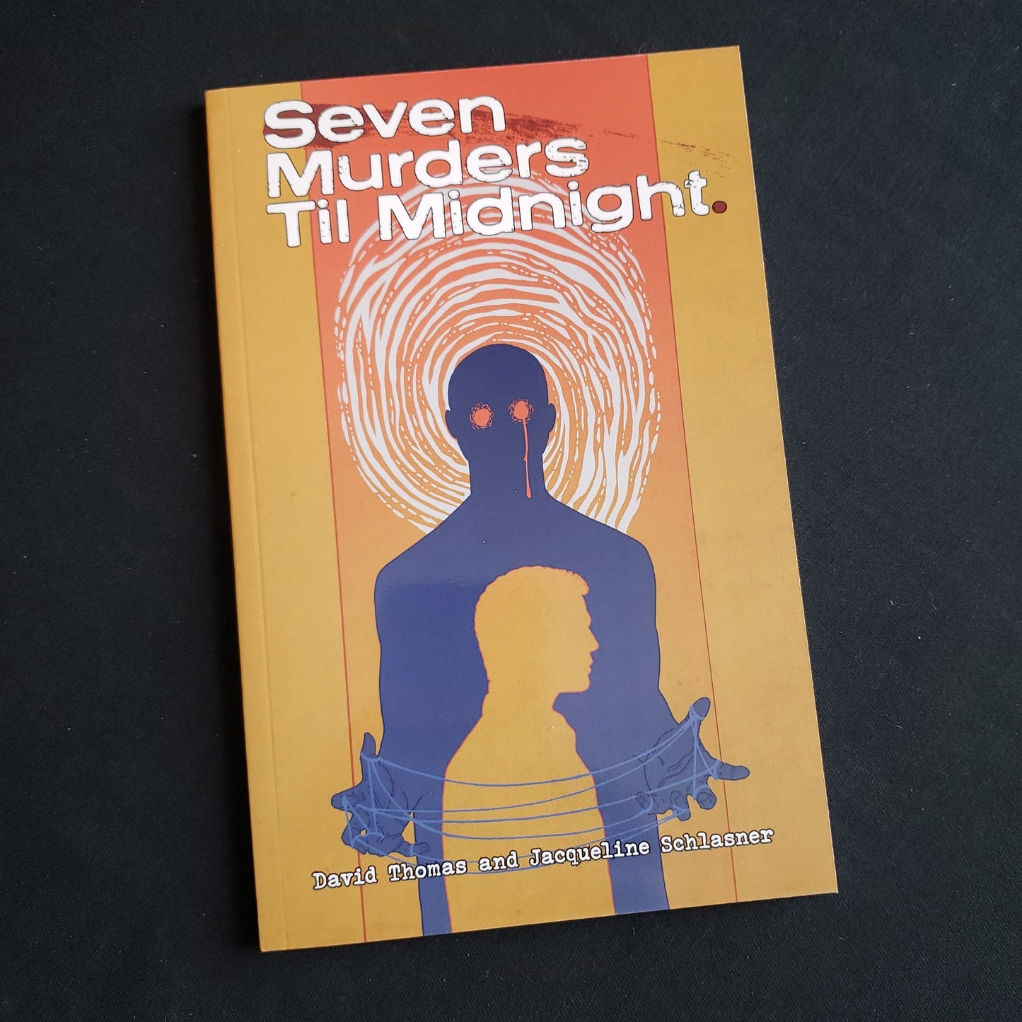 Image shows the front cover of the Seven Murders Til Midnight roleplaying game book