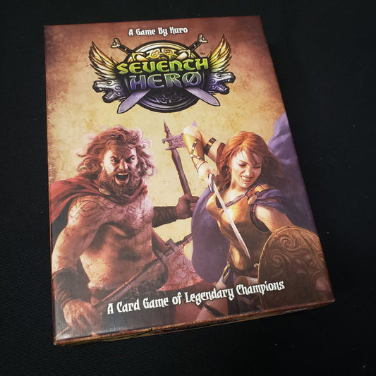 Image shows the front cover of the box of the Seventh Hero card game