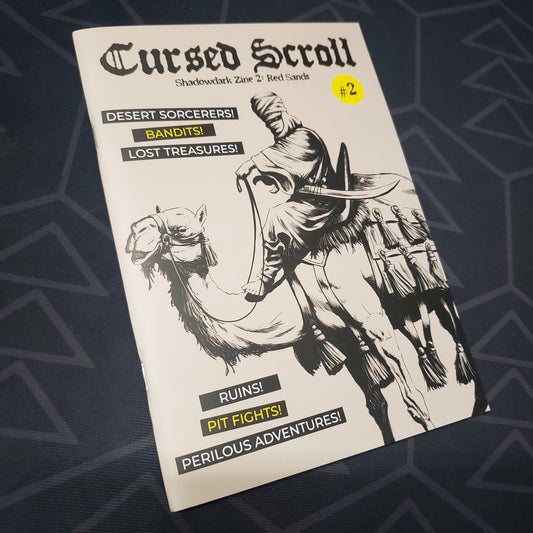 Image shows the front cover of the Cursed Scroll 02: Red Sands book for the roleplaying game Shadowdark