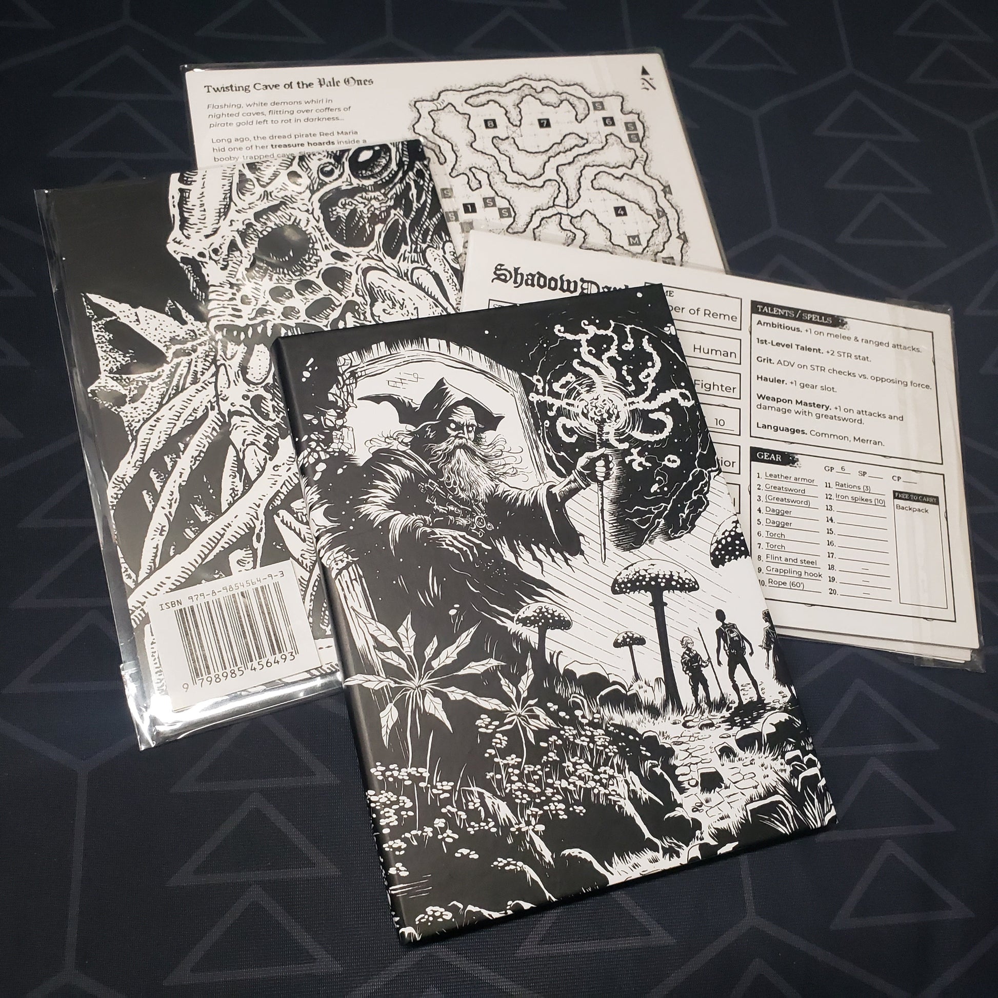 Image shows the front panel of the Gamemaster's Screen for the roleplaying game Shadowdark, surrounded by bonus content packs