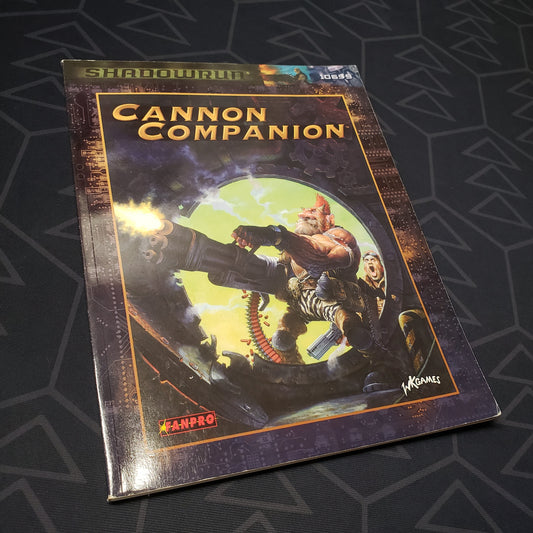 Image shows the front cover of the Cannon Companion book for the roleplaying game Shadowrun 3E