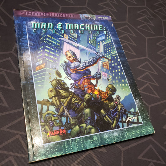 Image shows the front cover of the Man & Machine: Cyberwear book for the roleplaying game Shadowrun 3E