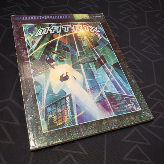Image shows the front cover of the Matrix book for the roleplaying game Shadowrun 3E