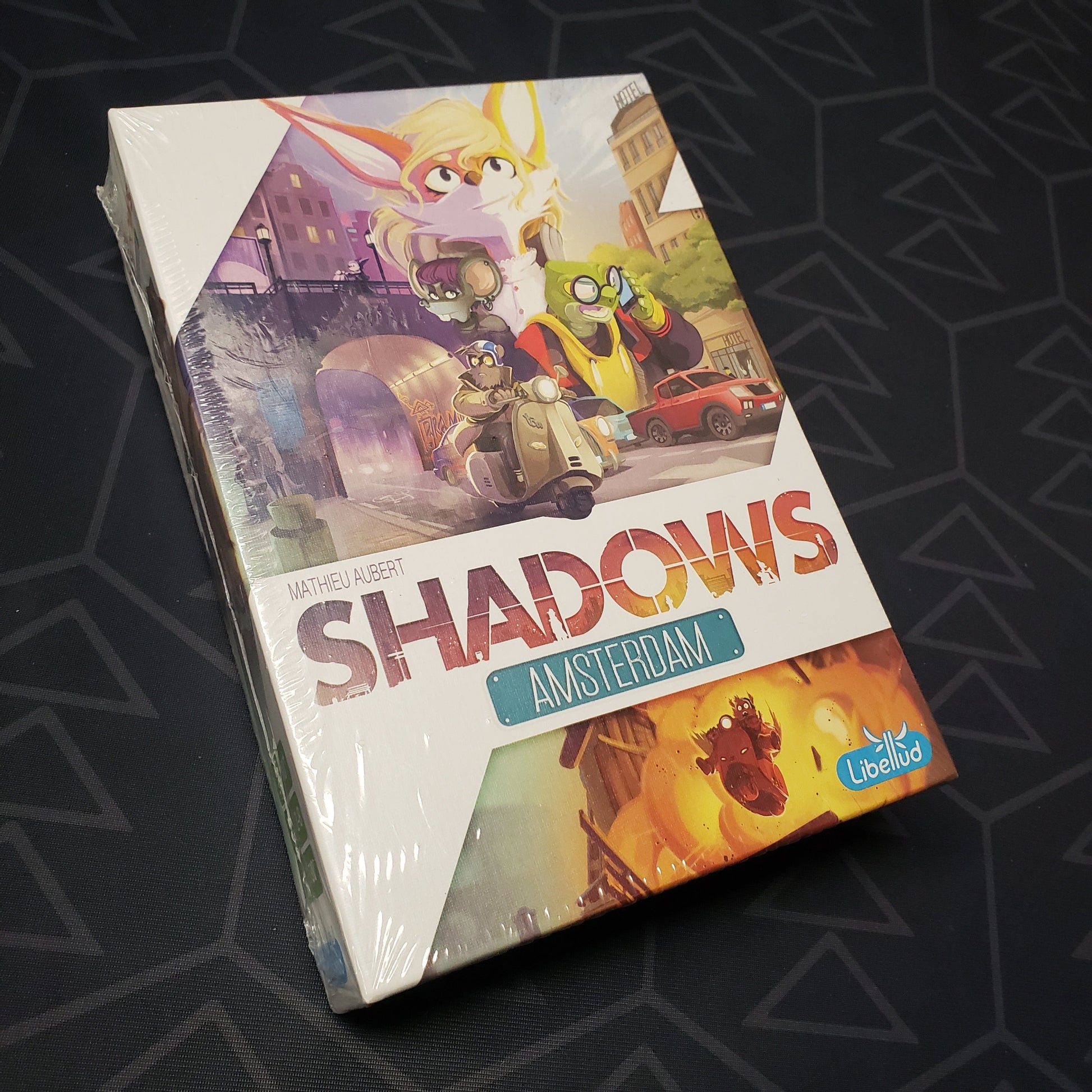 Image shows the front cover of the box for the Shadows: Amsterdam board game