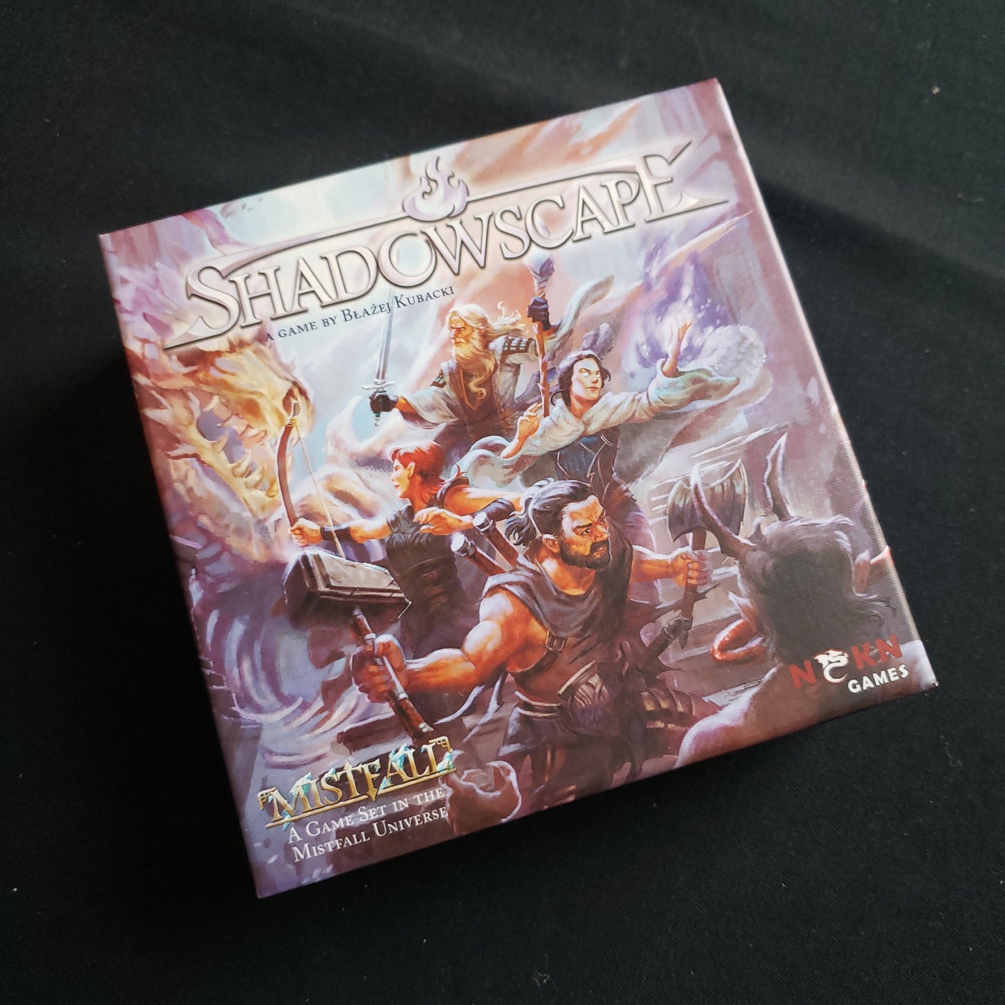 Image shows the front cover of the box of the Shadowscape board game