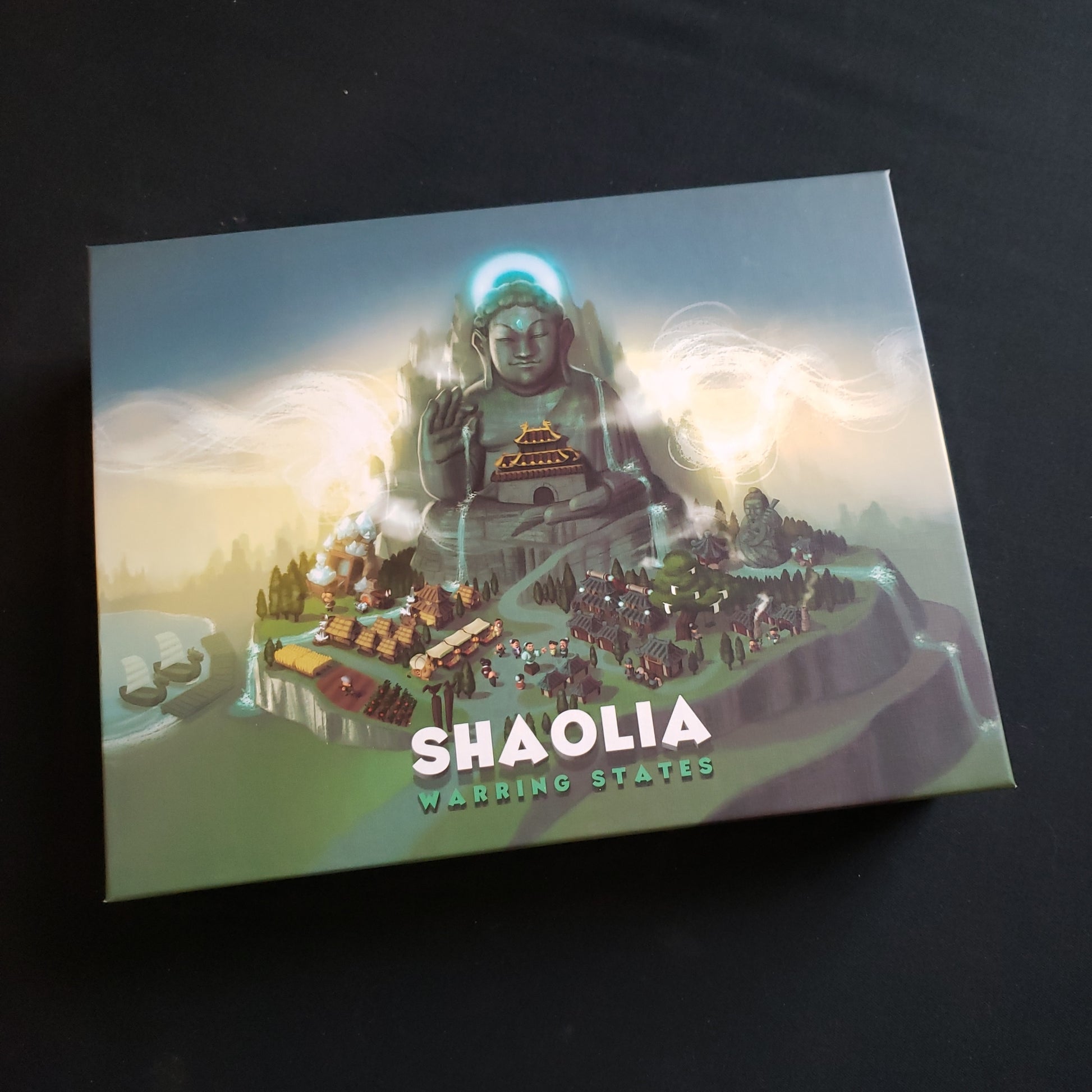 Image shows the front cover of the box of the Shaolia: Warring States board game