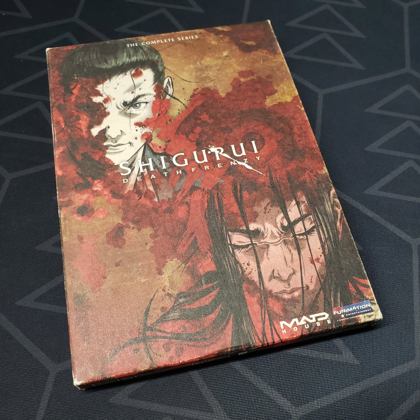 Image shows the front of the box of Shigurui: Death Frenzy - The Complete Series on DVD