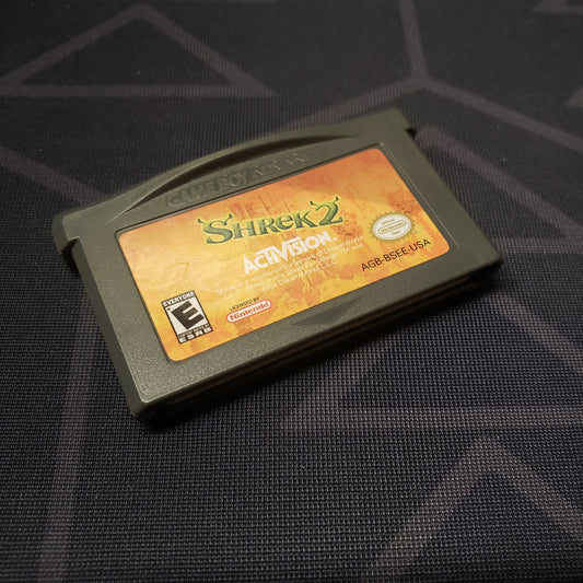 Image shows the front of the cartridge for the video game Shrek 2 for Nintendo Game Boy Advance
