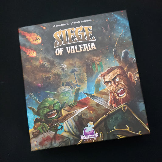 Image shows the front cover of the box of the Siege of Valeria board game