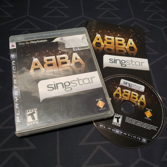 Image shows the case, manual and disc for the video game SingStar ABBA for Playstation 3