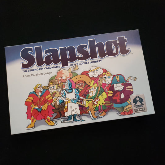 Image shows the front cover of the box of the Slapshot card game