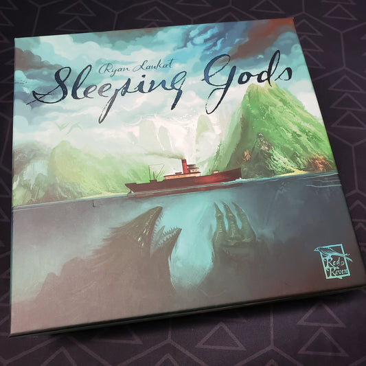 Image shows the front cover of the box for the Sleeping Gods board game