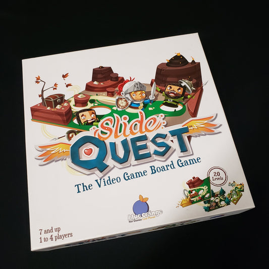 Image shows the front cover of the box of the Slide: Quest board game