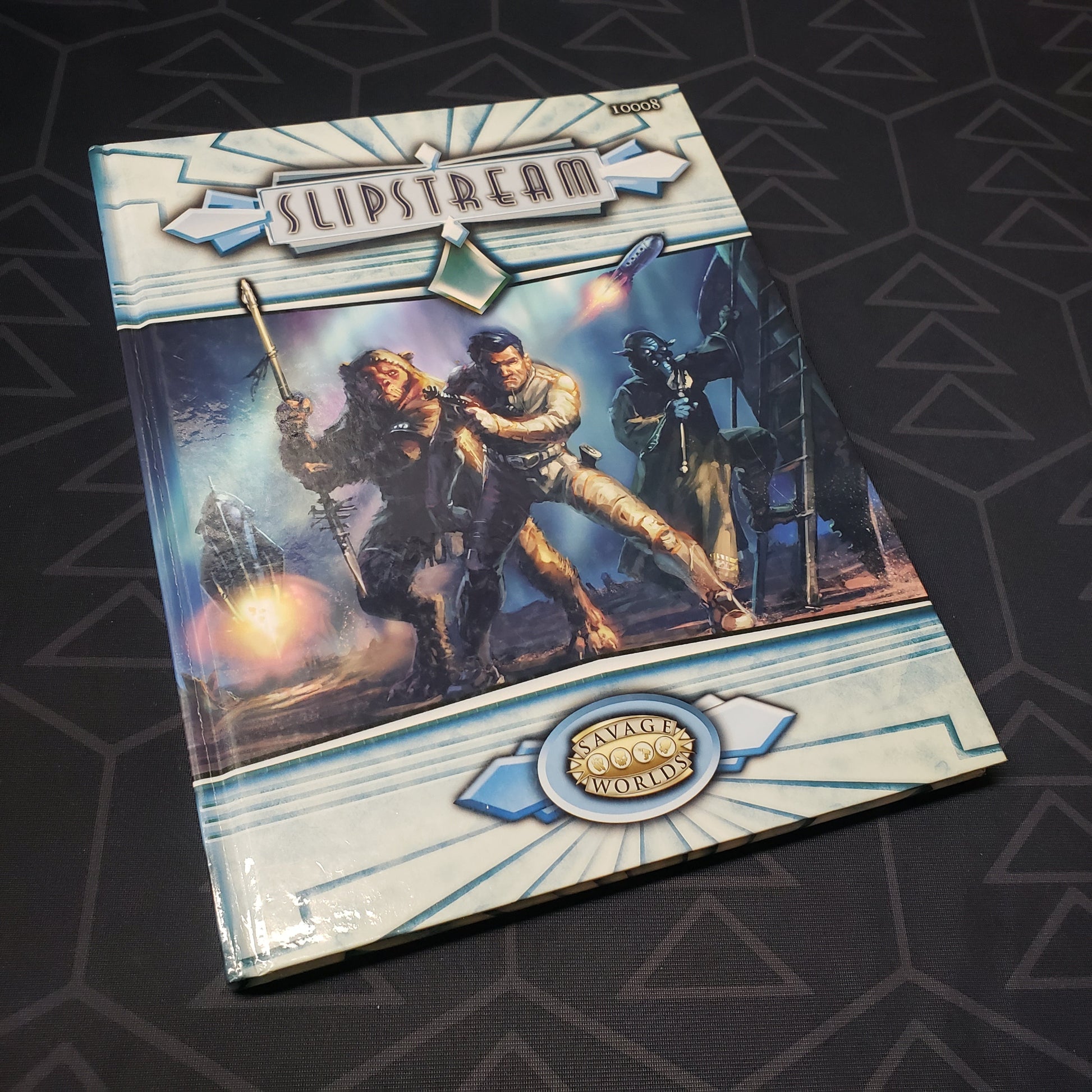 Image shows the front cover of the Slipstream (Savage Worlds) roleplaying game book