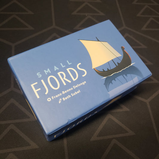 Image shows the front cover of the box for the Small Fjords board game