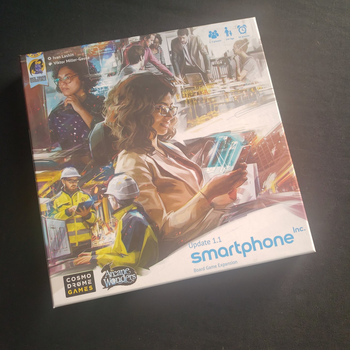 Image shows the front cover of the box of the Update 1.1 expansion for the Smartphone Inc. board game