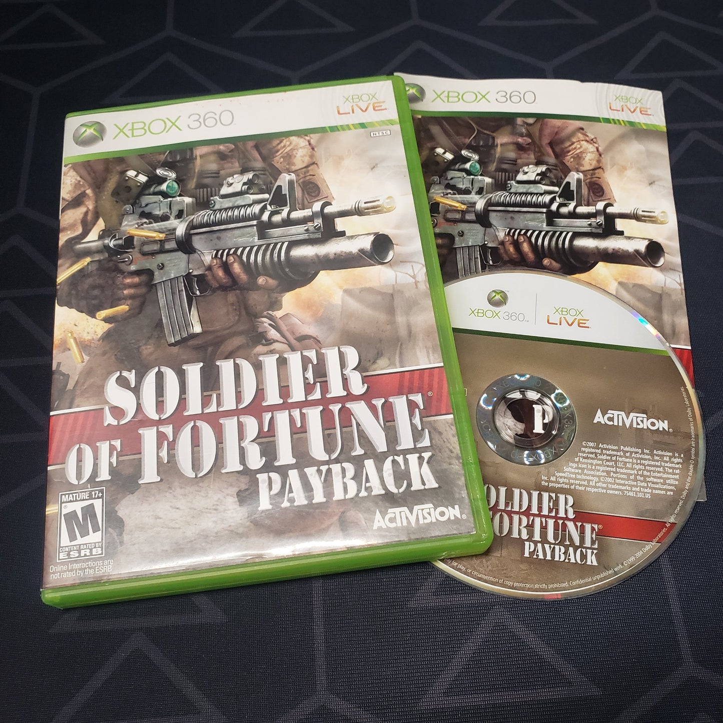 Image shows the case, manual & disc for the video game Soldier of Fortune: Payback for Xbox 360
