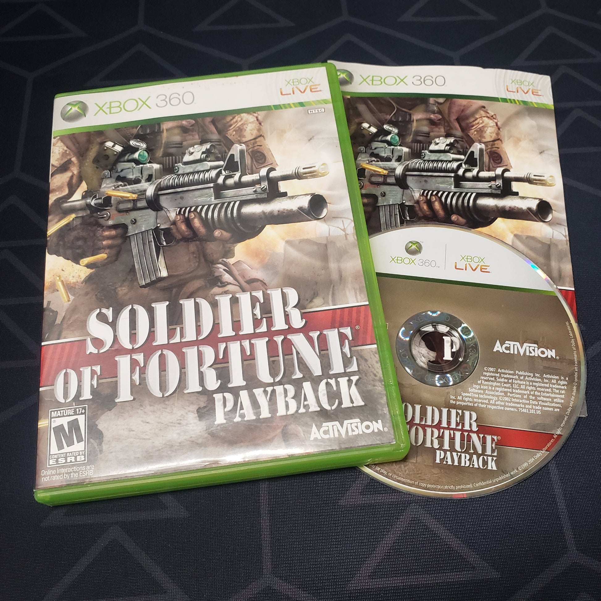 Image shows the case, manual & disc for the video game Soldier of Fortune: Payback for Xbox 360