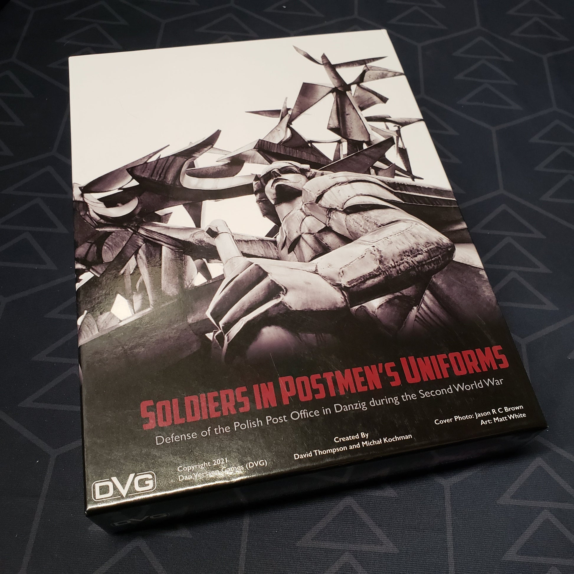 Image shows the front cover of the box for the Soldiers in Postmen's Uniforms board game