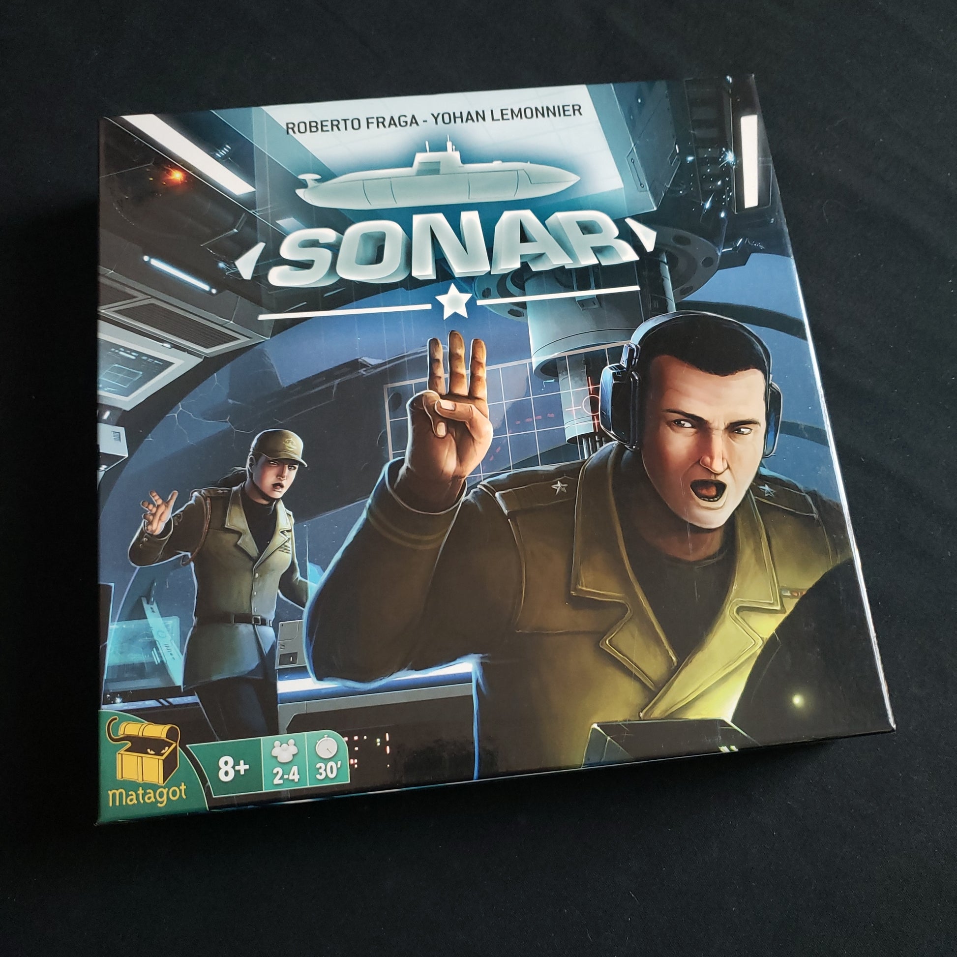 Image shows the front cover of the box of the Sonar board game